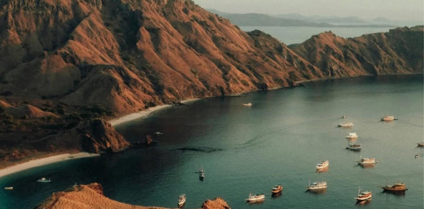 Padar Island ridges and sheltered bays at sunset